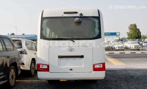 Nunua Imported Toyota Coaster Nyeupe Gari ndani ya Import - Dubai nchini Bujumbura Nunua Imported Toyota Coaster Nyeupe Gari ndani ya Import - Dubai nchini Bujumbura