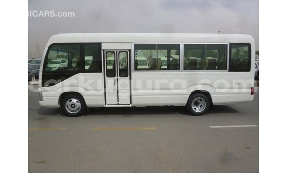Nunua Imported Toyota Coaster Nyeupe Gari ndani ya Import - Dubai nchini Bujumbura Nunua Imported Toyota Coaster Nyeupe Gari ndani ya Import - Dubai nchini Bujumbura