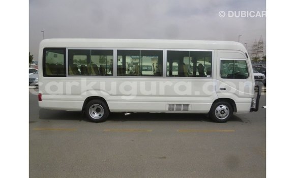 Nunua Imported Toyota Coaster Nyeupe Gari ndani ya Import - Dubai nchini Bujumbura Nunua Imported Toyota Coaster Nyeupe Gari ndani ya Import - Dubai nchini Bujumbura