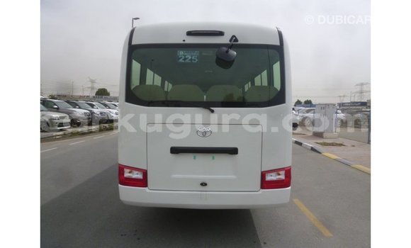 Nunua Imported Toyota Coaster Nyeupe Gari ndani ya Import - Dubai nchini Bujumbura Nunua Imported Toyota Coaster Nyeupe Gari ndani ya Import - Dubai nchini Bujumbura