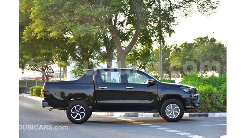Big with watermark toyota hilux bujumbura import dubai 3571