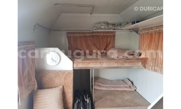 Nunua Imported Kia Carens Nyeupe Gari ndani ya Import - Dubai nchini Bujumbura Nunua Imported Kia Carens Nyeupe Gari ndani ya Import - Dubai nchini Bujumbura