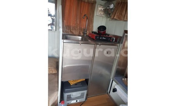 Nunua Imported Kia Carens Nyeupe Gari ndani ya Import - Dubai nchini Bujumbura Nunua Imported Kia Carens Nyeupe Gari ndani ya Import - Dubai nchini Bujumbura