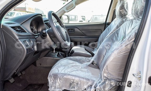 Buy Import Mitsubishi L200 White Car in Import - Dubai in Bujumbura Buy Import Mitsubishi L200 White Car in Import - Dubai in Bujumbura