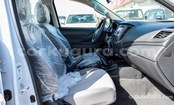 Buy Import Mitsubishi L200 White Car in Import - Dubai in Bujumbura Buy Import Mitsubishi L200 White Car in Import - Dubai in Bujumbura