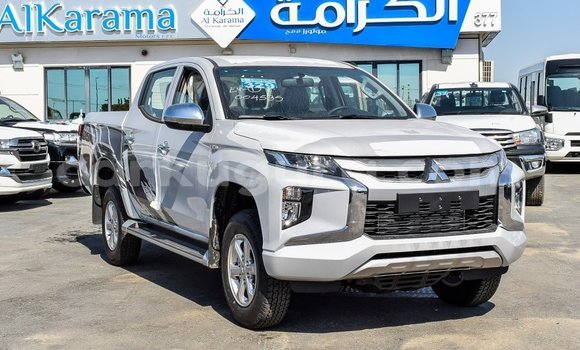 Buy Import Mitsubishi L200 White Car in Import - Dubai in Bujumbura Buy Import Mitsubishi L200 White Car in Import - Dubai in Bujumbura