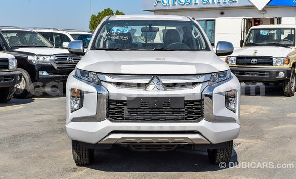 Buy Import Mitsubishi L200 White Car in Import - Dubai in Bujumbura Buy Import Mitsubishi L200 White Car in Import - Dubai in Bujumbura
