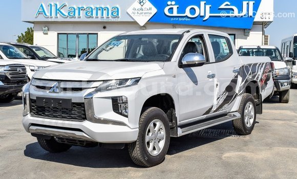 Buy Import Mitsubishi L200 White Car in Import - Dubai in Bujumbura Buy Import Mitsubishi L200 White Car in Import - Dubai in Bujumbura