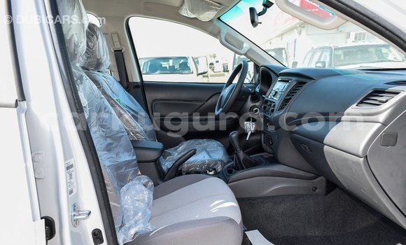 Buy Import Mitsubishi L200 White Car in Import - Dubai in Bujumbura Buy Import Mitsubishi L200 White Car in Import - Dubai in Bujumbura