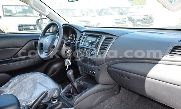 Buy Import Mitsubishi L200 White Car in Import - Dubai in Bujumbura Buy Import Mitsubishi L200 White Car in Import - Dubai in Bujumbura