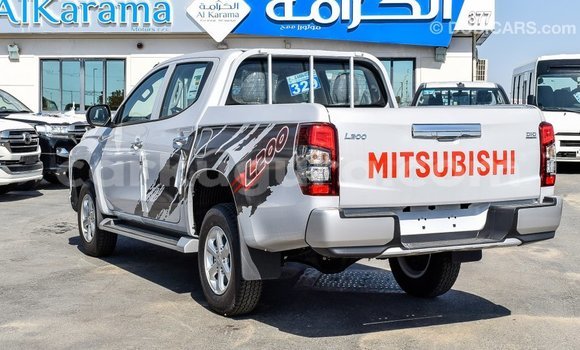 Buy Import Mitsubishi L200 White Car in Import - Dubai in Bujumbura Buy Import Mitsubishi L200 White Car in Import - Dubai in Bujumbura