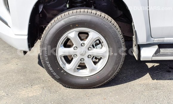 Buy Import Mitsubishi L200 White Car in Import - Dubai in Bujumbura Buy Import Mitsubishi L200 White Car in Import - Dubai in Bujumbura