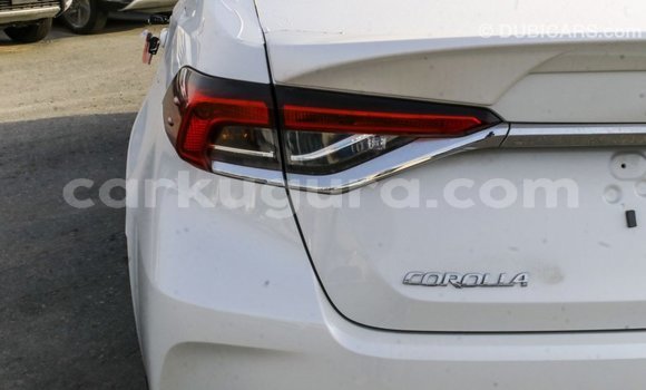 Nunua Imported Toyota Corolla Nyeupe Gari ndani ya Import - Dubai nchini Bujumbura Nunua Imported Toyota Corolla Nyeupe Gari ndani ya Import - Dubai nchini Bujumbura