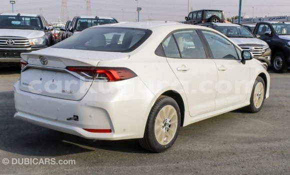 Nunua Imported Toyota Corolla Nyeupe Gari ndani ya Import - Dubai nchini Bujumbura Nunua Imported Toyota Corolla Nyeupe Gari ndani ya Import - Dubai nchini Bujumbura