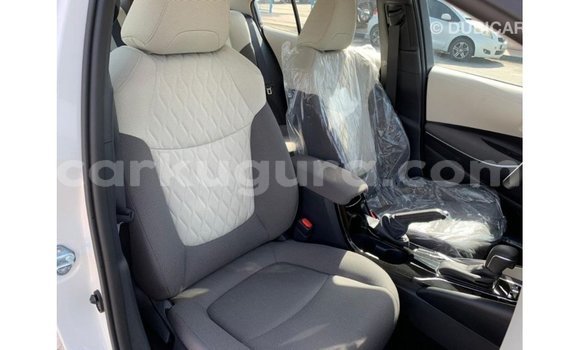 Nunua Imported Toyota Corolla Nyeupe Gari ndani ya Import - Dubai nchini Bujumbura Nunua Imported Toyota Corolla Nyeupe Gari ndani ya Import - Dubai nchini Bujumbura