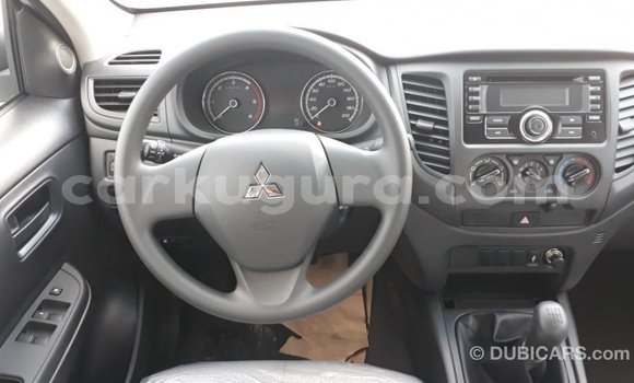 Buy Import Mitsubishi L200 White Car in Import - Dubai in Bujumbura Buy Import Mitsubishi L200 White Car in Import - Dubai in Bujumbura
