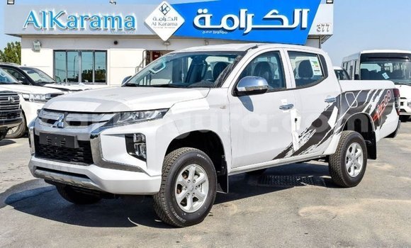 Buy Import Mitsubishi L200 White Car in Import - Dubai in Bujumbura Buy Import Mitsubishi L200 White Car in Import - Dubai in Bujumbura