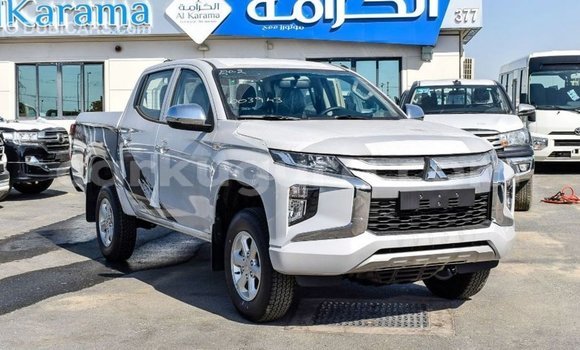 Buy Import Mitsubishi L200 White Car in Import - Dubai in Bujumbura Buy Import Mitsubishi L200 White Car in Import - Dubai in Bujumbura