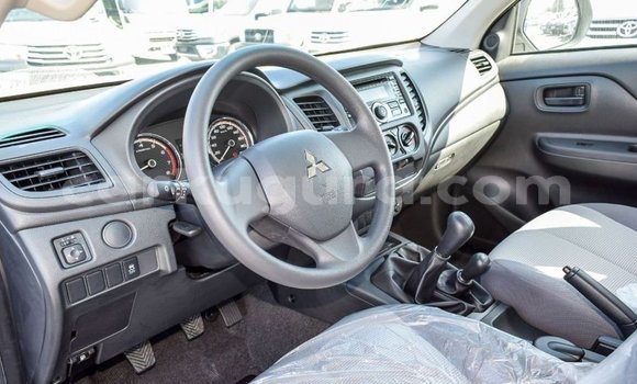 Buy Import Mitsubishi L200 White Car in Import - Dubai in Bujumbura Buy Import Mitsubishi L200 White Car in Import - Dubai in Bujumbura