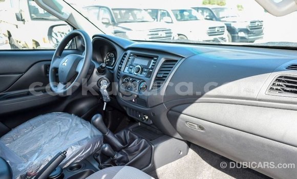 Buy Import Mitsubishi L200 White Car in Import - Dubai in Bujumbura Buy Import Mitsubishi L200 White Car in Import - Dubai in Bujumbura