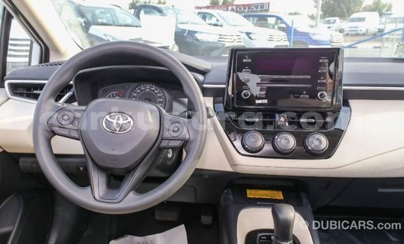 Buy Import Toyota Corolla White Car in Import - Dubai in Bujumbura Buy Import Toyota Corolla White Car in Import - Dubai in Bujumbura