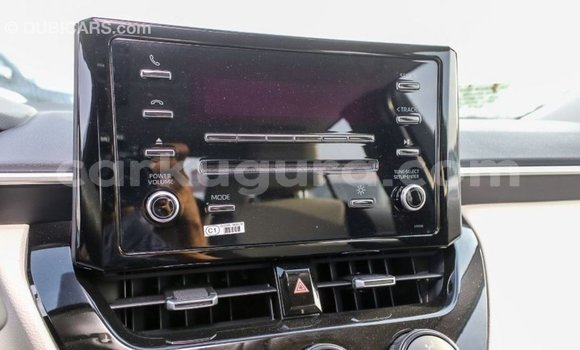 Buy Import Toyota Corolla White Car in Import - Dubai in Bujumbura Buy Import Toyota Corolla White Car in Import - Dubai in Bujumbura