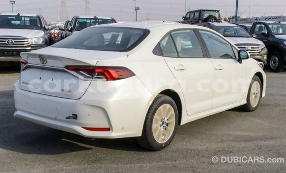 Buy Import Toyota Corolla White Car in Import - Dubai in Bujumbura Buy Import Toyota Corolla White Car in Import - Dubai in Bujumbura