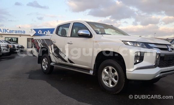 Buy Import Mitsubishi L200 White Car in Import - Dubai in Bujumbura Buy Import Mitsubishi L200 White Car in Import - Dubai in Bujumbura