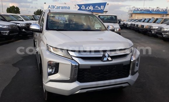 Buy Import Mitsubishi L200 White Car in Import - Dubai in Bujumbura Buy Import Mitsubishi L200 White Car in Import - Dubai in Bujumbura