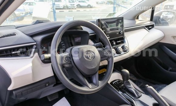 Buy Import Toyota Corolla White Car in Import - Dubai in Bujumbura Buy Import Toyota Corolla White Car in Import - Dubai in Bujumbura