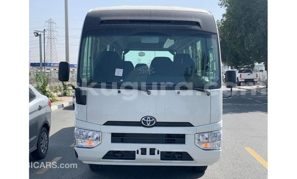 Buy Import Toyota Coaster White Car in Import - Dubai in Bujumbura Buy Import Toyota Coaster White Car in Import - Dubai in Bujumbura