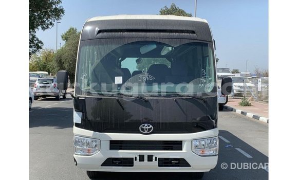 Nunua Imported Toyota Coaster Nyeupe Gari ndani ya Import - Dubai nchini Bujumbura Nunua Imported Toyota Coaster Nyeupe Gari ndani ya Import - Dubai nchini Bujumbura