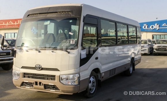Nunua Imported Toyota Coaster Nyeupe Gari ndani ya Import - Dubai nchini Bujumbura Nunua Imported Toyota Coaster Nyeupe Gari ndani ya Import - Dubai nchini Bujumbura