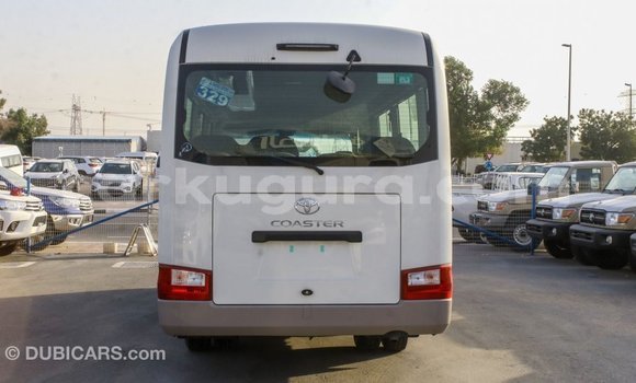 Nunua Imported Toyota Coaster Nyeupe Gari ndani ya Import - Dubai nchini Bujumbura Nunua Imported Toyota Coaster Nyeupe Gari ndani ya Import - Dubai nchini Bujumbura
