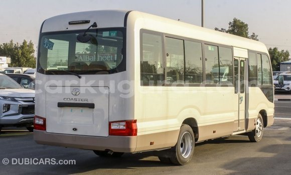 Nunua Imported Toyota Coaster Nyeupe Gari ndani ya Import - Dubai nchini Bujumbura Nunua Imported Toyota Coaster Nyeupe Gari ndani ya Import - Dubai nchini Bujumbura