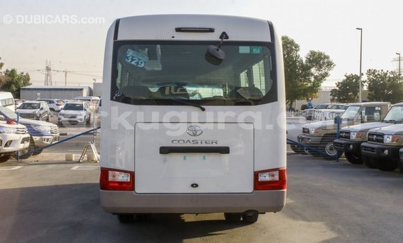 Nunua Imported Toyota Coaster Nyeupe Gari ndani ya Import - Dubai nchini Bujumbura Nunua Imported Toyota Coaster Nyeupe Gari ndani ya Import - Dubai nchini Bujumbura