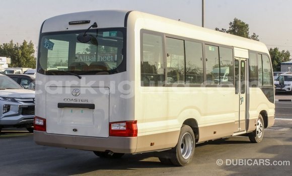 Nunua Imported Toyota Coaster Nyeupe Gari ndani ya Import - Dubai nchini Bujumbura Nunua Imported Toyota Coaster Nyeupe Gari ndani ya Import - Dubai nchini Bujumbura