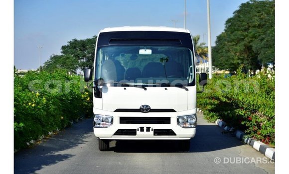 Acheter Import Voiture Toyota Coaster Blanc à Import - Dubai, Bujumbura Acheter Import Voiture Toyota Coaster Blanc à Import - Dubai, Bujumbura