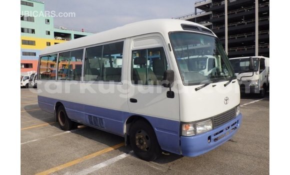 Acheter Import Voiture Toyota Coaster Blanc à Import - Dubai, Bujumbura Acheter Import Voiture Toyota Coaster Blanc à Import - Dubai, Bujumbura