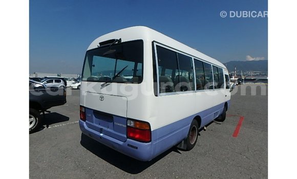 Acheter Import Voiture Toyota Coaster Blanc à Import - Dubai, Bujumbura Acheter Import Voiture Toyota Coaster Blanc à Import - Dubai, Bujumbura
