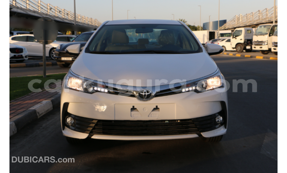 Buy Import Toyota Corolla White Car in Import - Dubai in Bujumbura Buy Import Toyota Corolla White Car in Import - Dubai in Bujumbura