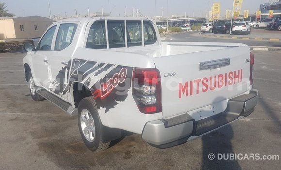 Buy Import Mitsubishi L200 White Car in Import - Dubai in Bujumbura Buy Import Mitsubishi L200 White Car in Import - Dubai in Bujumbura