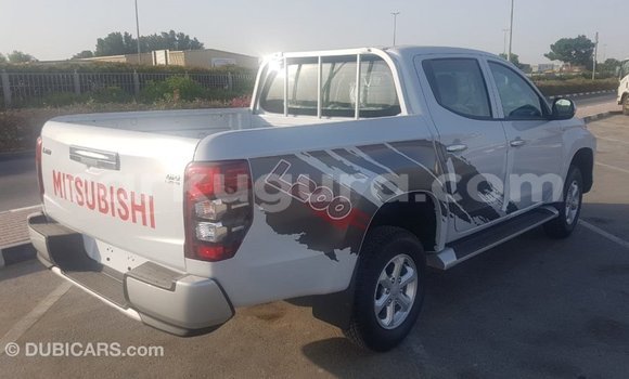 Buy Import Mitsubishi L200 White Car in Import - Dubai in Bujumbura Buy Import Mitsubishi L200 White Car in Import - Dubai in Bujumbura