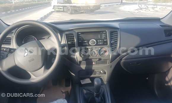 Buy Import Mitsubishi L200 White Car in Import - Dubai in Bujumbura Buy Import Mitsubishi L200 White Car in Import - Dubai in Bujumbura