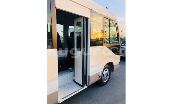 Buy Import Toyota Coaster White Car in Import - Dubai in Bujumbura Buy Import Toyota Coaster White Car in Import - Dubai in Bujumbura