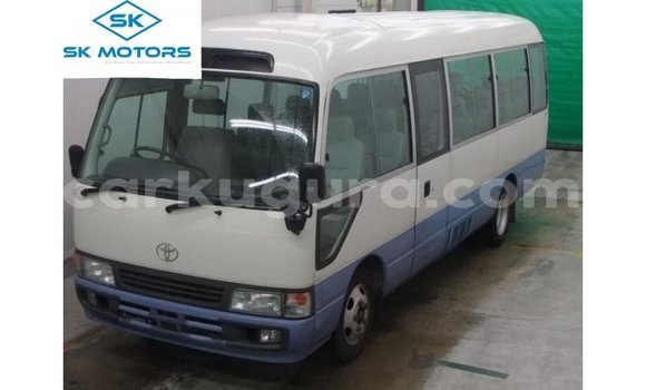 Acheter Import Voiture Toyota Coaster Blanc à Import - Dubai, Bujumbura Acheter Import Voiture Toyota Coaster Blanc à Import - Dubai, Bujumbura