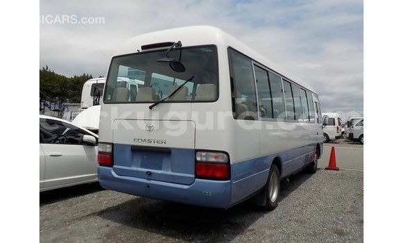 Acheter Import Voiture Toyota Coaster Blanc à Import - Dubai, Bujumbura Acheter Import Voiture Toyota Coaster Blanc à Import - Dubai, Bujumbura