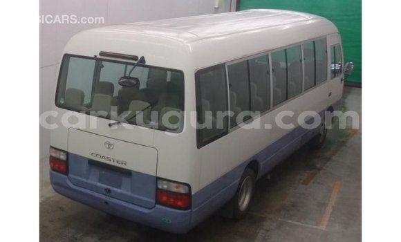 Acheter Import Voiture Toyota Coaster Blanc à Import - Dubai, Bujumbura Acheter Import Voiture Toyota Coaster Blanc à Import - Dubai, Bujumbura