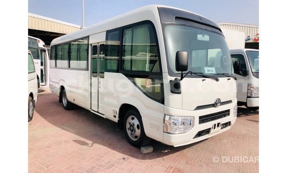 Acheter Import Voiture Toyota Coaster Blanc à Import - Dubai, Bujumbura Acheter Import Voiture Toyota Coaster Blanc à Import - Dubai, Bujumbura