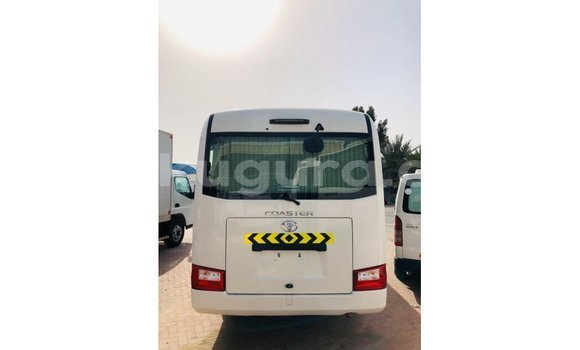 Acheter Import Voiture Toyota Coaster Blanc à Import - Dubai, Bujumbura Acheter Import Voiture Toyota Coaster Blanc à Import - Dubai, Bujumbura